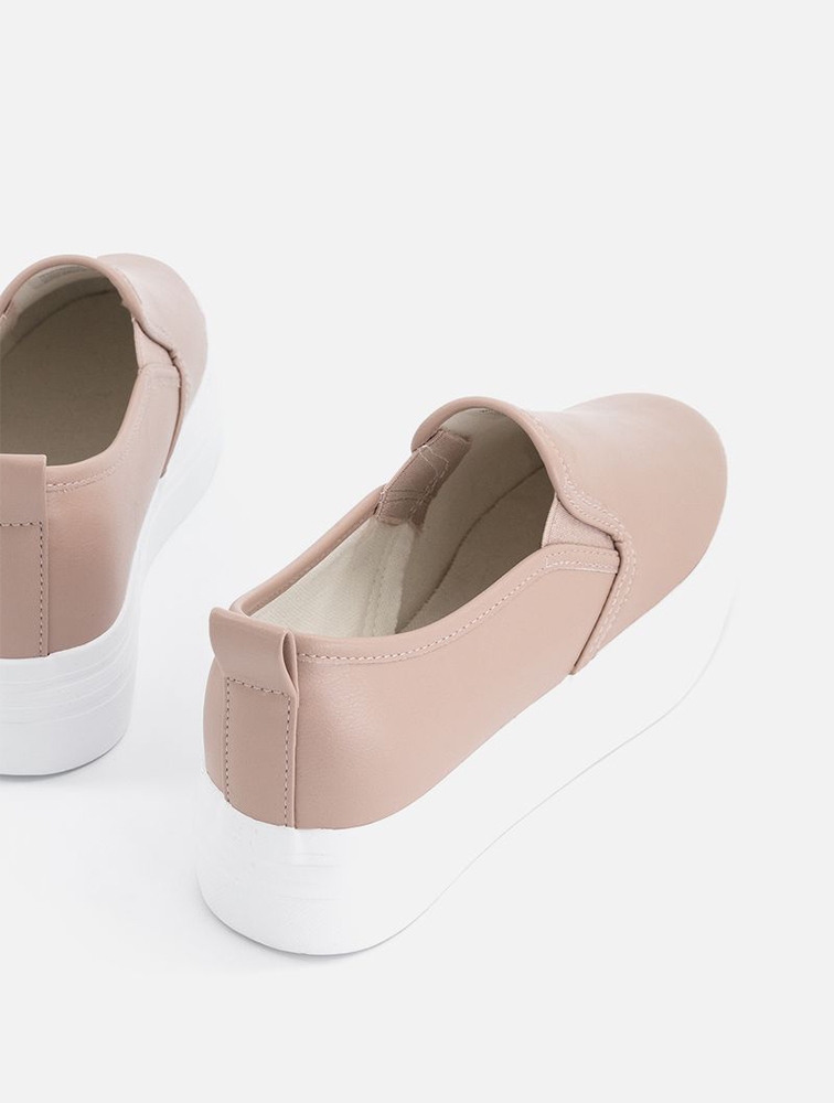 Nude slip top on sneakers